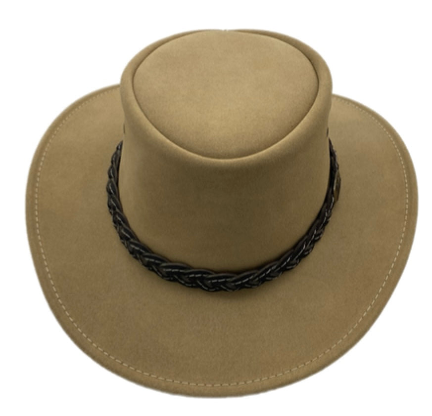 Top-down view of tan suede hat with braided band