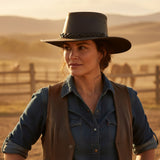 Woman wearing a Jacaru 1092 Stockman Hat and vest in a desert setting