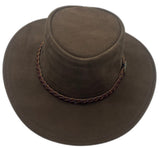 A brown leather hat with a wide brim and a decorative band around the crown, featuring metal eyelets and a button detail.
