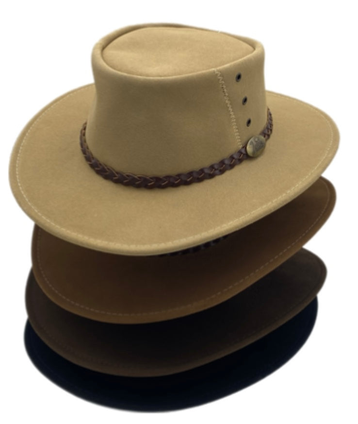 Four stacked suede outback hats from tan to dark brown.