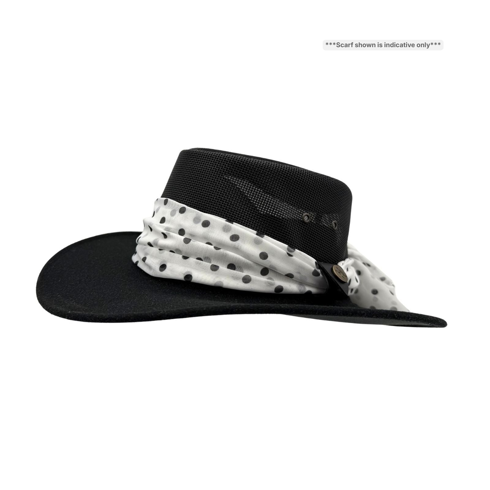 Black hat with a white polka dot scarf on a white background