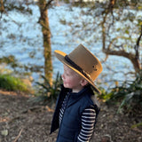 a Child Wearing a sand Jacaru 1301 Children's hat