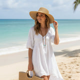 a women wearing Light Brown Jacaru 1853 Roll Up Hat
