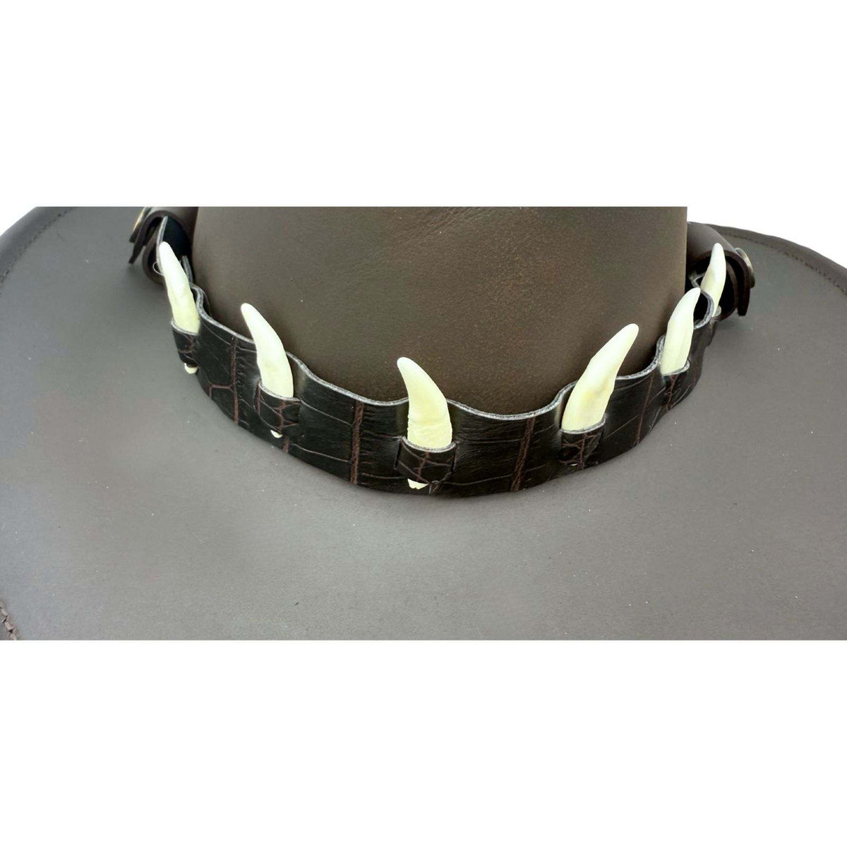 Jacaru 6582 dark leather hatband with six mini bone decorations attached to brown leather hat.