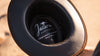 Close-up of a Jacaru Australia product with branding and text.
