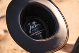 Close-up of a black cup holder with 'Jacaru Australia' branding.
