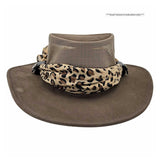 Brown wide-brimmed hat with a leopard print scarf on a white background
