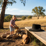 a Black Jacaru 1301 Suede Children's leather hat on top of the bench