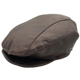 A Brown kangaroo leather driver's cap with visible stitching and a flat brim.