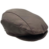 A Brown kangaroo leather driver's cap with visible stitching and a flat brim.