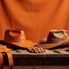 Professional header image for comparison analysis: Kangaroo Leather Hats vs Cowhide: Aussie Showdown