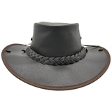 A dark brown Jacaru 101 Boundary Rider Bovine Leather Hatwith a chin strap, featuring a wide brim and a decorative braided band around the crown.