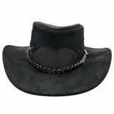 A Black Jacaru 1021 Blaze hat with a mesh crown and bovine leather, featuring a decorative detail on the front.