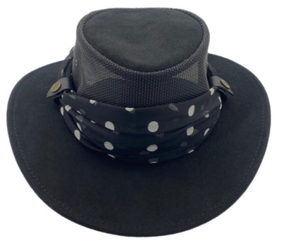 Black wide-brimmed hat with a polka dot print scarf on a white background