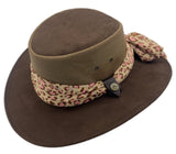 Brown wide-brimmed hat with a leopard print scarf on a white background