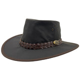 A brown Jacaru 1026A Knockabout hat with a waxed cotton finish, featuring a memory wire brim and a braided band with a metal buckle.