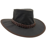 A brown Jacaru 1026A Knockabout hat with a waxed cotton finish, featuring a memory wire brim and a braided band with a metal buckle.