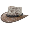 A Jacaru 1049 Rustler leather hat with a cowhide pattern and a braided leather band.