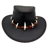 Black Wallaroo Croc Hat with a band featuring white teeth-like embellishments on a white background