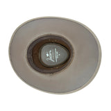 Inside a tan Jacaru Australia wide-brim hat.