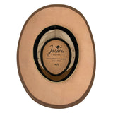 Beige cowboy hat with Jacaru Australia label on a white background