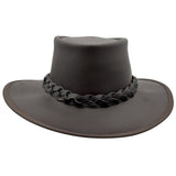 A brown Jacaru 1092 Stockman hat with a braided band and a small Jacaru logo on the front, designed for sun protection.