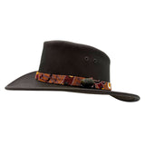 Brown Koori Hat with a patterned band on a white background