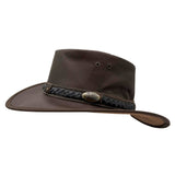 Brown leather hat with a decorative band on a white background