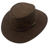 A brown leather hat with a wide brim and a decorative band around the crown, featuring metal eyelets and a button detail.