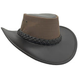 Brown and black wide-brimmed hat with braided band on a white background