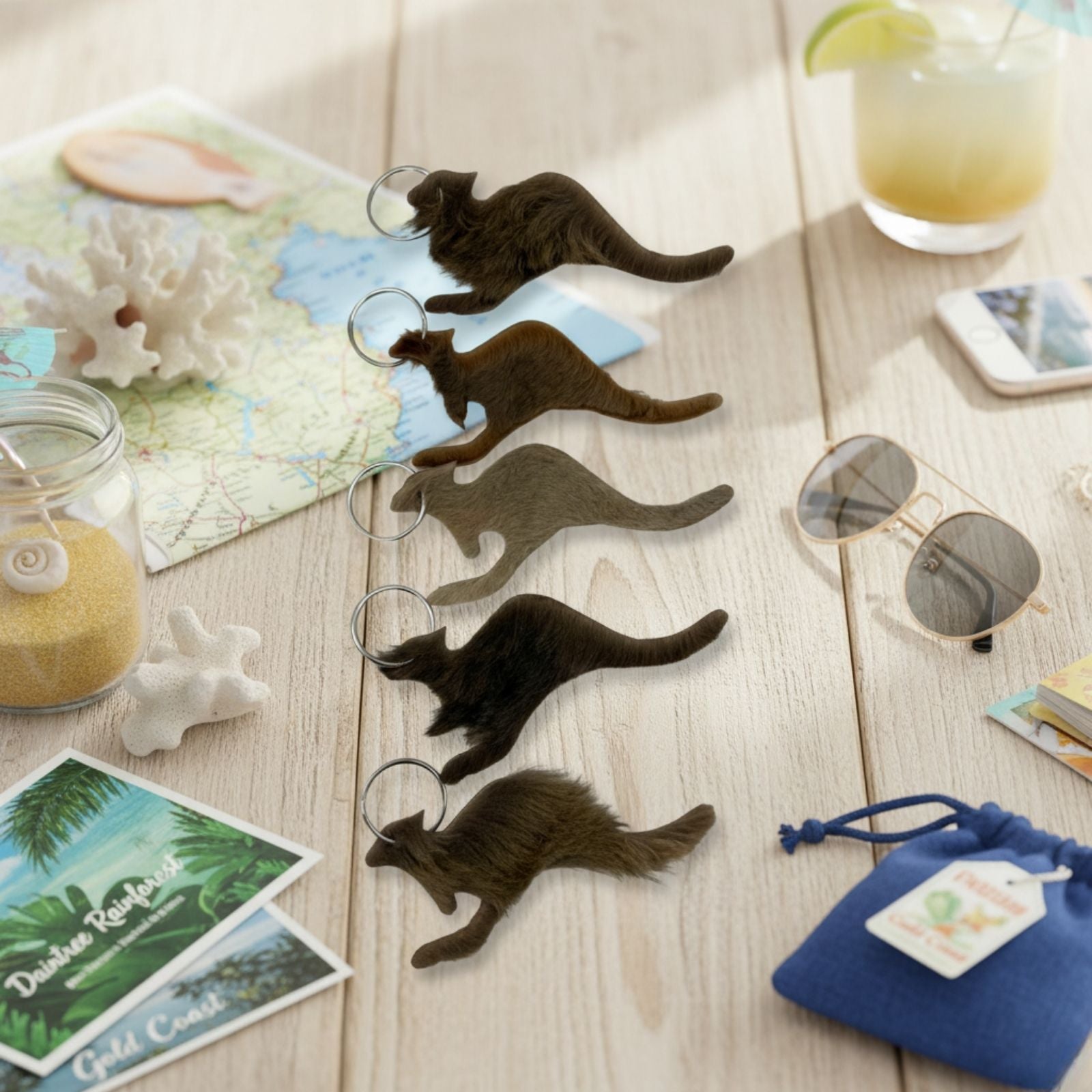 Jacaru kangaroo fur keyring set on wooden table