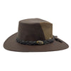 A brown Jacaru 1150 Kangaroo Breeze hat with a braided band and metal button detail on the crown, featuring a wide brim.
