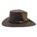A brown Jacaru 1150 Kangaroo Breeze hat with a braided band and metal button detail on the crown, featuring a wide brim.