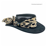 Black hat with a leopard print scarf on a white background