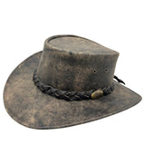 A brown Jacaru 1004 Explorer hat with a leather band and a unique stonewash color, displayed on a white background.