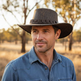 Man in a denim shirt wearing a Jacaru 1002 Wild Roo Limited Edition Hat Stonewash Brown