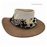 Brown wide-brimmed hat with a patterned scarf on a white background