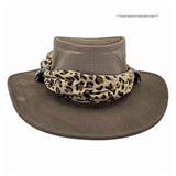 Brown wide-brimmed hat with a leopard print scarf on a white background