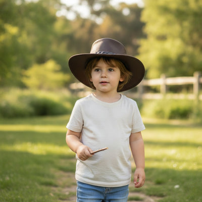a child wearing brown Jacaru 1301K Children's Kangaroo