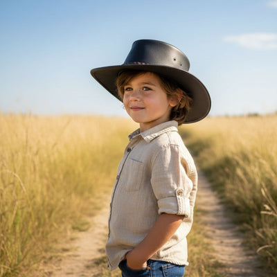 a child wearing a brown waxedJacaru 1301W Children's Waxed 