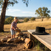 a Black Jacaru 1301 Suede Children's leather hat on top of the bench 