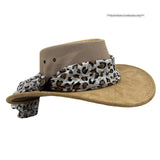 Beige hat with a leopard print scarf on a white background