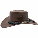 A brown Jacaru 1001A Kangaroo hat with a foldable leather crown and a braided leather band around the base.